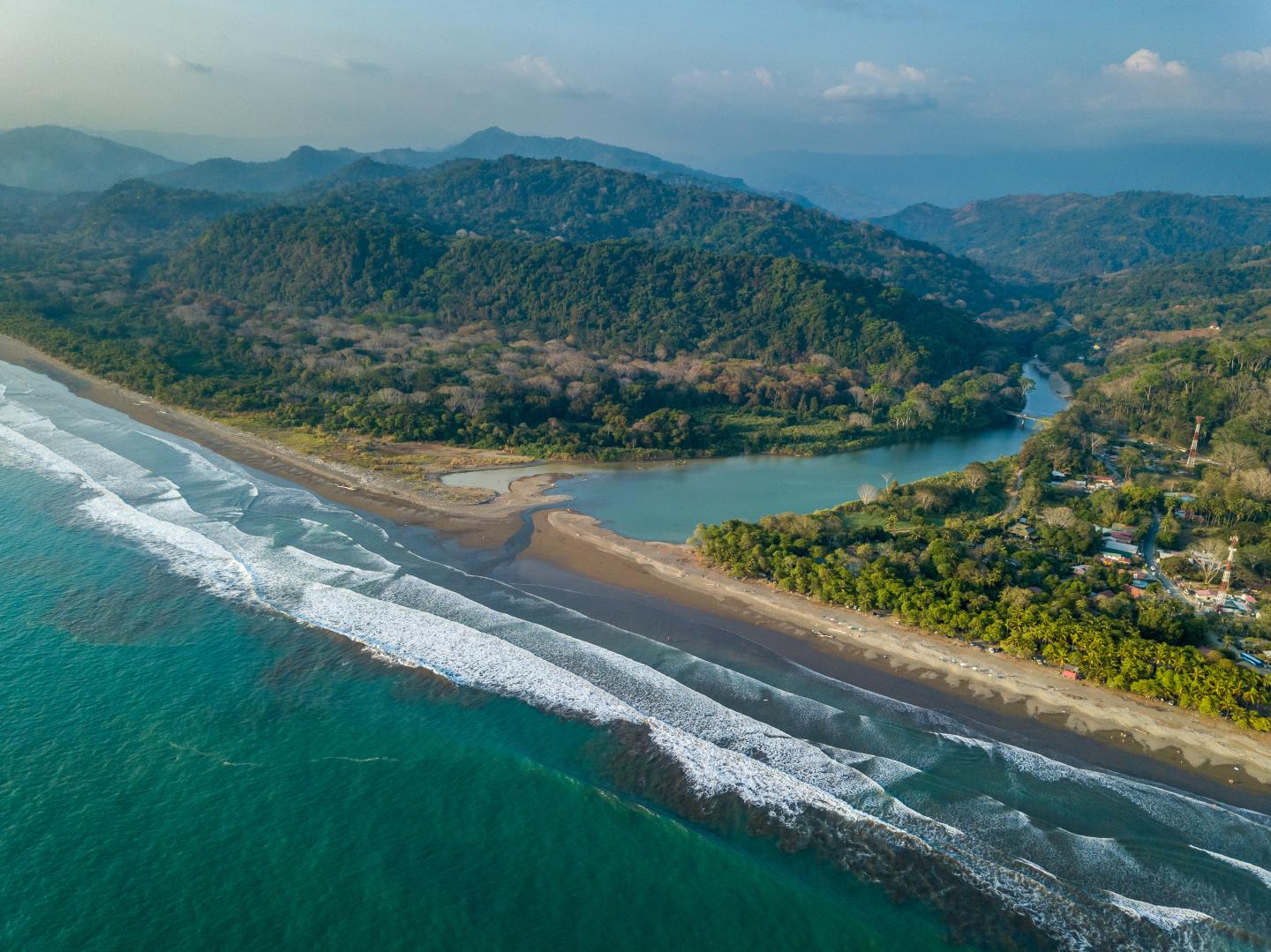 Beautiful aerial view of the Beach in Dominical and the Baru River in Costa Rica